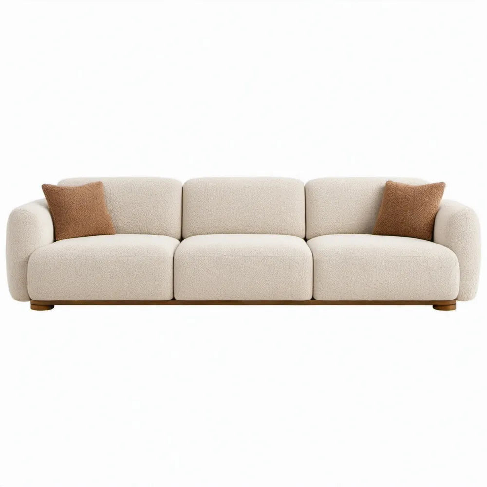 Moderne 3-zitsbank 240 x 100 x 75 cm in crèmekleurig bouclé met bruine sierkussens